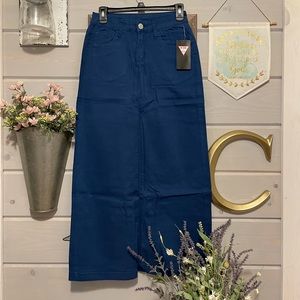Long teal colored denim skirt